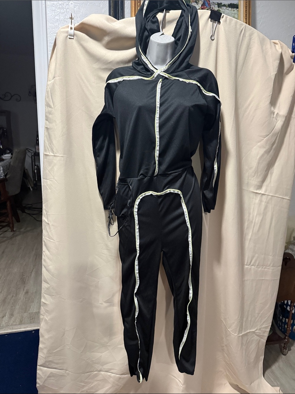 Black Hooded Jumpsuit with Reflective Trim Light up green